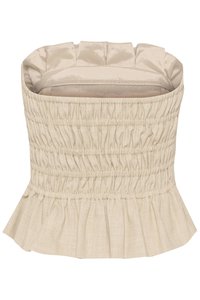 Haut en tissu smocké beige avec un ourlet volanté, doté d'une doublure en satin lisse et d'une forme structurée. Surface texturée avec un détail froncé.