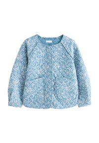 Giacca trapuntata blu con motivo floreale bianco, collo rotondo, due tasche anteriori e maniche lunghe. Tessuto morbido.