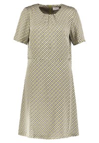 Kurzes Kleid aus leichtem, strukturiertem Stoff. Gelber Grundton mit einem geometrischen Muster, das schwarze und weiße Akzente aufweist. Runder Ausschnitt.