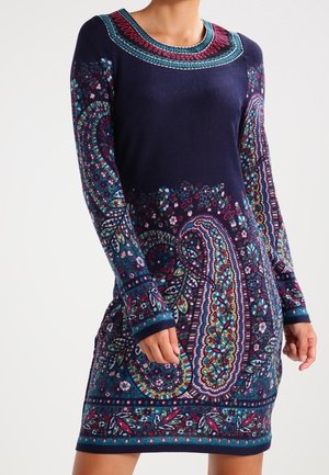Robe bleu marine à manches longues avec des motifs cachemire et floraux colorés, comprenant des accents rose, sarcelle et bleu, et un col rond.