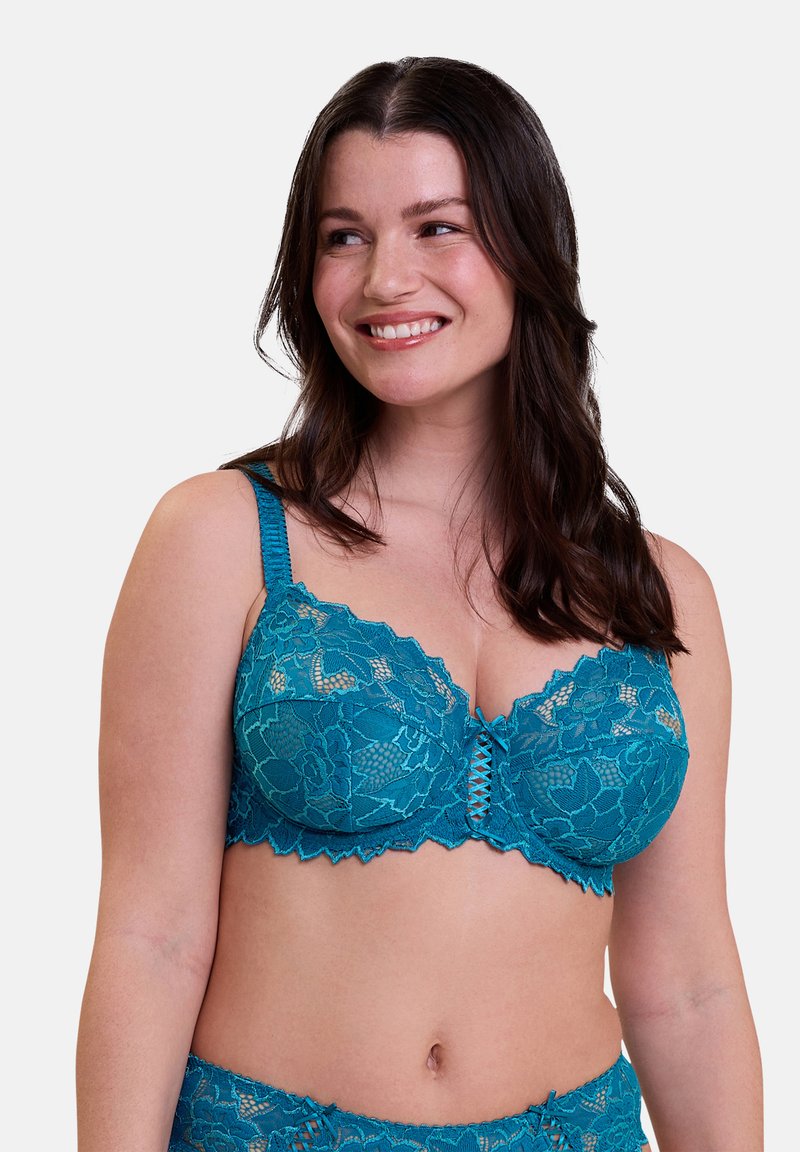 Teal kant bh met bloemenpatroon, geschulpte randen en een sluiting aan de voorkant met kruisdetails. Verstelbare bandjes voor een goede pasvorm.