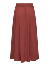 Jupe longueur cheville de couleur rouille avec ceinture élastique, fabriquée en tissu texturé léger, silhouette fluide en ligne A.