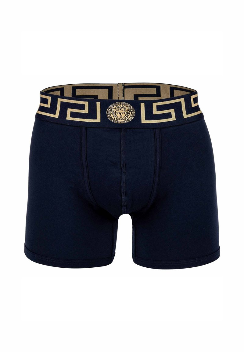 Navy boxer briefs with a gold geometric waistband featuring a Medusa emblem. Crafted from soft fabric with a snug fit and flat seams.