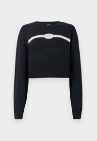 Sweatshirt noir à manches longues raccourci en coton, avec une bande blanche et rose et un logo Roxy sur le devant.