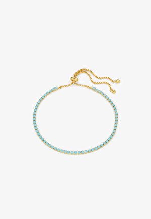 Gouden armband met een ketting, voorzien van lichtblauwe ronde stenen, verstelbare schuifsluiting, met een gladde textuur en een uniform ontwerp.