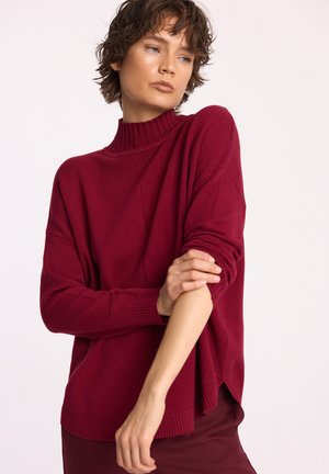 - Sweter
