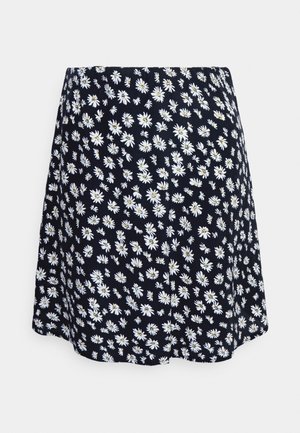 Jupe noire avec motif floral en marguerites blanches, taille élastique, tissu léger, forme évasée, longueur genou, non doublée.