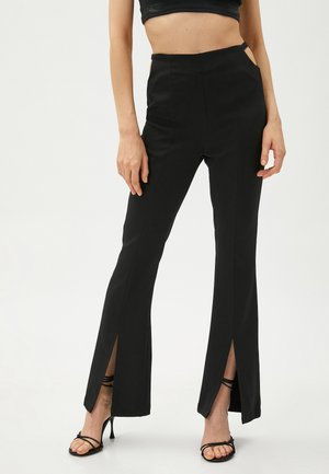CUT OUT DETAIL - Broek - black