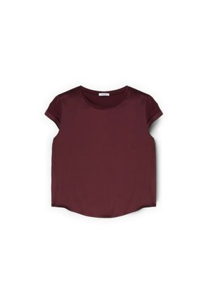 Top corto a maniche corte color bordeaux con scollo rotondo e bordo delle maniche piegato, posato su uno sfondo bianco.