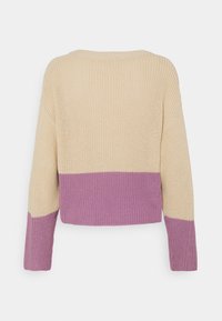 Knit sweater with a crew neck, featuring a beige upper and a purple lower section. Textured design with long sleeves and ribbed hem.