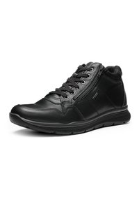 Black leather high-top sneaker with laces and side zipper, cushioned collar, and textured rubber sole.