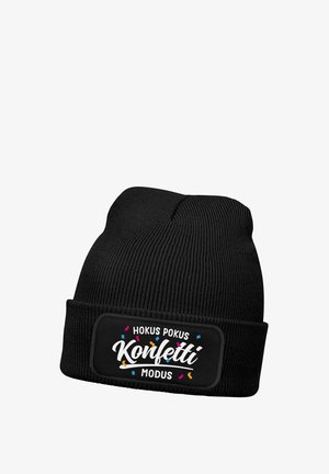 Black knit beanie with folded cuff featuring colorful confetti and white text "Hokus Pokus Konfetti Modus" on front patch.