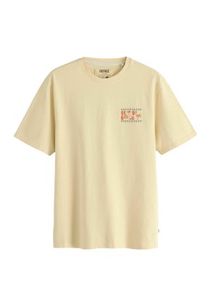 Yellow cotton t-shirt with a crew neck, featuring a small “OUT OF OFFICE” printed design in orange and gray, with a palm tree graphic.