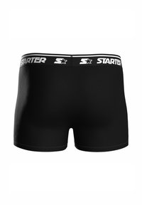Schwarze Boxershorts aus glattem Stoff mit einem breiten elastischen Bund, der das "STARTER"-Logo und einen Sterne-Akzent trägt.
