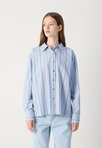 Light blue striped shirt with vertical red stripes, button front, collared neckline, relaxed fit, and long sleeves. Smooth cotton fabric.