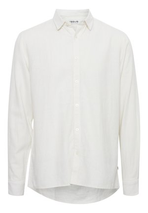 Camisa blanca de manga larga y botones, hecha de una tela ligera. Cuenta con un collar clásico y un dobladillo curvado, con cinco botones en la parte delantera.