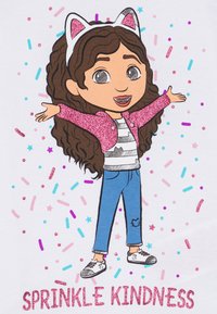 Tegneseriefigur med krøllete brunt hår, iført en rosa glitterjakke over en stripete skjorte og blå jeans, omgitt av fargerik konfetti og teksten "Strø vennlighet".