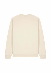 Sweat-shirt de couleur crème avec un col rond, des manches raglan et des poignets côtelés. Texture lisse, design minimal et sans logos ni motifs visibles.