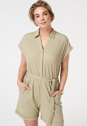 Lichtgroene, short-sleeve romper met kraag, knoopsluiting aan de voorkant, elastische taille en ceintuur. Heeft twee zijzakken en een gestructureerde stof.