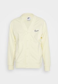Nike Sportswear Tröja med dragkedja - light yellow