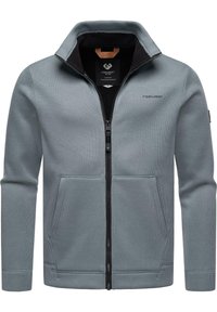 Graue Zip-Jacke mit hohem Kragen, geripptem Material, zwei Fronttaschen, schwarzem Innenfutter und dezenter Markenkennzeichnung auf der Brust.