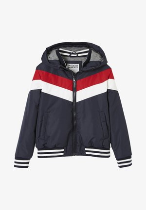 Navy hooded jacket with red and white diagonal stripes, zip closure, two front pockets, and striped cuffs at the hem. Lightweight material.