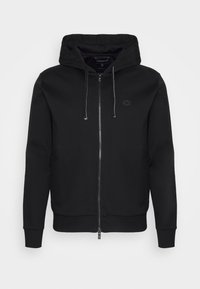 Felpa nera con zip realizzata in tessuto misto cotone. Caratterizzata da cappuccio con coulisse, tasche anteriori e logo discreto sul petto. Tessuto resistente.