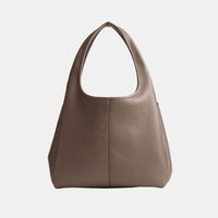 Brown leather hobo handbag with a wide, rounded strap and a simple, smooth textured surface against a plain background.