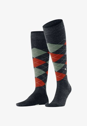 Calze fino al ginocchio di colore grigio scuro con un motivo a diamante in verde, rosso e blu navy. Presentano una punta e un tallone a contrasto, con un piccolo logo sul lato.