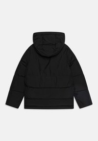 Jack & Jones Junior JJWORLD PUFFER - Zimná bunda - black
