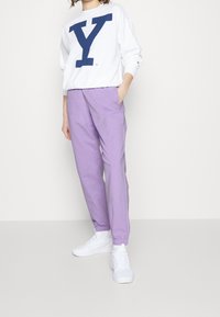 Champion Teplákové kalhoty - lilac