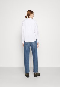 Levi's® CLASSIC SHIRT - Overhemdblouse - bright white