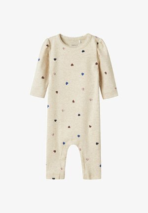 Beige gerippter Overall mit langen Ärmeln, verziert mit mehrfarbigen Herzmustern in Dunkelblau, Pink und Braun. Rundhalsausschnitt mit gewelltem Saum.