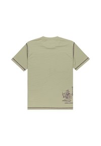 Cotton t-shirt in light green with a ribbed texture, featuring short sleeves and a graphic print in dark brown on the lower back.