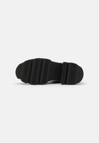 ALDO Wide Fit Kotníkové boty na platformě - black