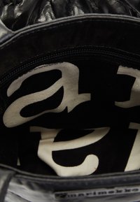 Marimekko CROSSBODY TOTE - Käsilaukku - black