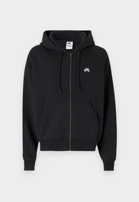 Felpa nera con zip realizzata in misto cotone. Presenta una tasca frontale, cappuccio regolabile con laccetti e logo Nike bianco sul lato sinistro del petto. Design semplice.