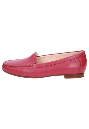 Red leather loafer with a rounded toe, stitched detailing along the upper, and a flat rubber sole. Slip-on design with minimal accents.