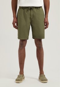 Olivgrüne Shorts aus leichtem Stoff, mit einem elastischen Bund und einem Kordelzug sowie Seitentaschen.