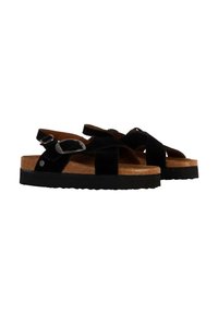 Sandalias de ante negro con correas entrecruzadas, plantilla de corcho y suela de goma negra. Cuenta con una hebilla ajustable para un ajuste seguro.
