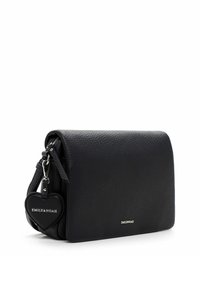 Black leather crossbody bag with a textured finish. Features a zip closure, adjustable strap, and heart-shaped charm labeled "EMILY & NOAH."