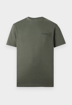 Plain dark green short-sleeve crew neck T-shirt with small subtle text logo on the left chest.