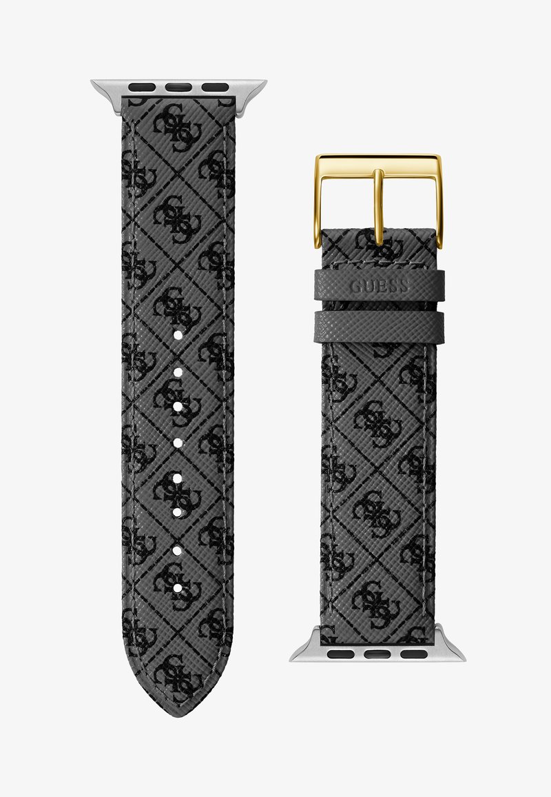 Guess karóra szíj, amely szürke mintázattal és fekete logókkal rendelkezik, ezüst színű fém csatlakozóval és arany színű állítási csattal.
