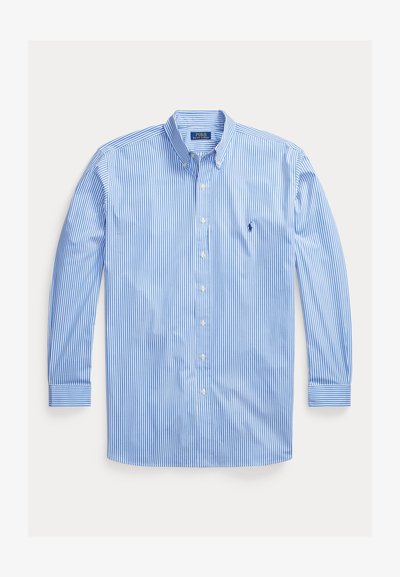 Herreskjorte med lange ermer, blå og hvite vertikale striper, knappelukking og krage, med brodert logo på venstre bryst.