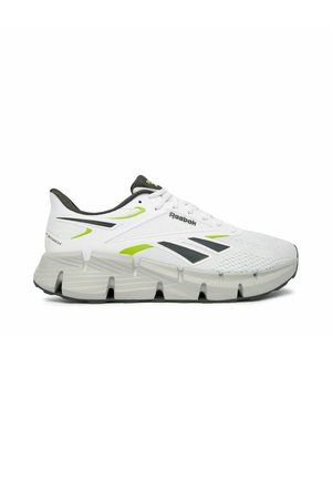 Weißer und grauer Reebok-Laufschuh mit neongrünen Akzenten, strukturierter Sohle, Mesh-Obermaterial und Schnürdesign, im Seitenprofil dargestellt.