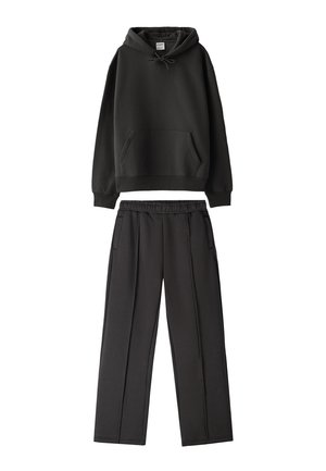 Dark gray hoodie and matching pants made of soft, textured fabric. Hoodie features a front pocket and adjustable drawstring. Pants have side pockets.