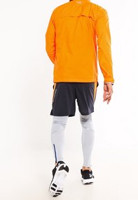 Under Armour Löparjacka - orange