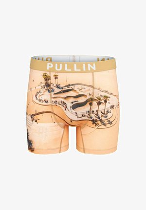 Boxers pour hommes avec un fond beige, présentant un graphisme détaillé de skatepark, contrasté par une ceinture élastique dorée portant l'inscription "PULLIN."
