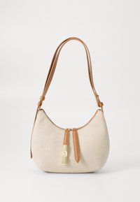 Beige canvas shoulder bag with a curved shape, tan leather strap, and gold-tone zipper detail with a decorative tag.