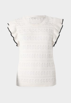 Haut en tricot blanc avec un motif texturé et des manches volantes. Accentué par une bordure noire le long des bords des manches.